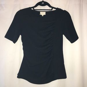 Black short sleeve top from Anthropologie